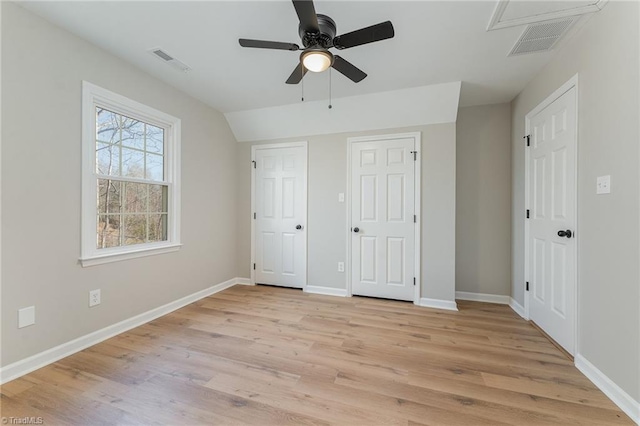 unfurnished bedroom featuring light wood-style floors, baseboards, and visible vents