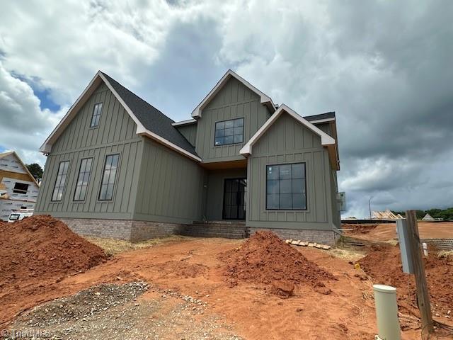 1341 Maple Chase Ln, Winston-Salem, NC 27106 - view of front of property with board and batten siding