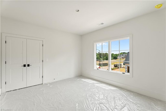 1341 Maple Chase Ln, Winston-Salem, NC 27106 - unfurnished bedroom featuring a closet
