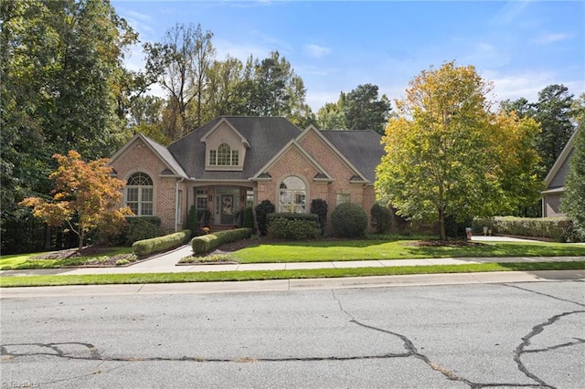 view of front of house with a front lawn