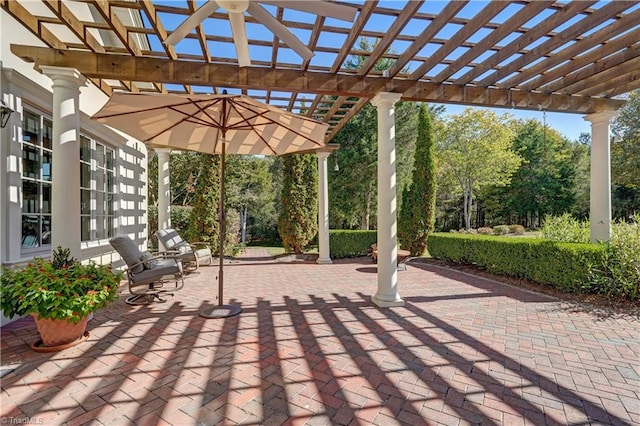 view of patio featuring a pergola