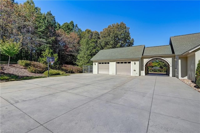 view of property exterior with a garage