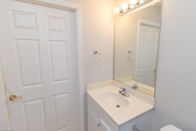 2221314 Delaney Dr, Burlington, NC 27215 - half bathroom featuring vanity and toilet