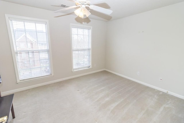 2221314 Delaney Dr, Burlington, NC 27215 - unfurnished room featuring a ceiling fan, baseboards, and light carpet