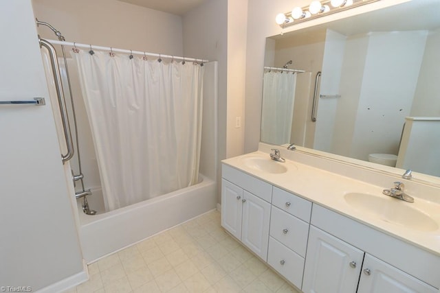 2221314 Delaney Dr, Burlington, NC 27215 - bathroom with double vanity, shower / tub combo with curtain, and toilet