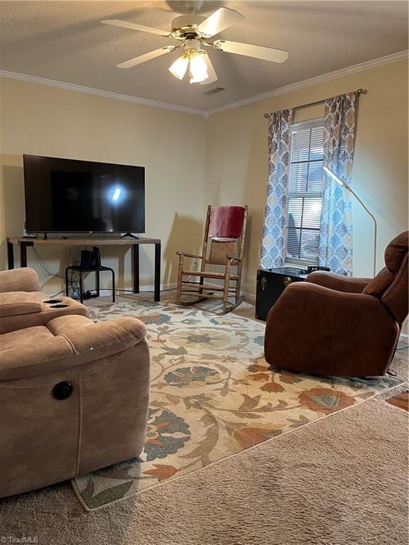 living room featuring ceiling fan and ornamental molding