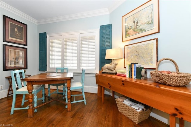 home office featuring baseboards, wood finished floors, and crown molding