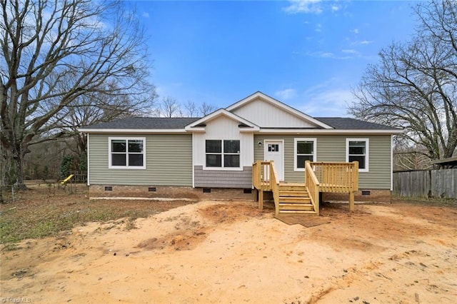 view of front of home with a wooden deck