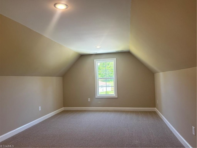 864 Midway School Rd, Winston-Salem, NC 27107 - bonus room with vaulted ceiling, carpet flooring, and baseboards