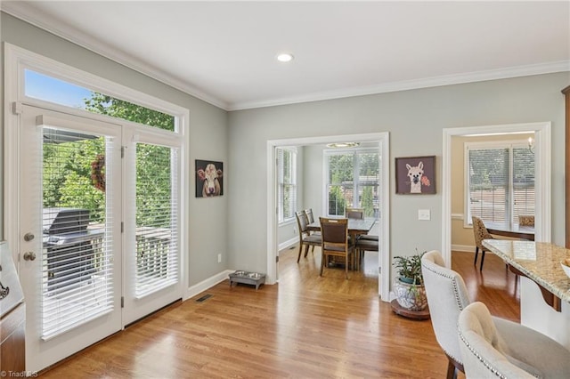 3741 Canter Dr, Trinity, NC 27370 - doorway to outside featuring ornamental molding, light wood-style flooring, and recessed lighting