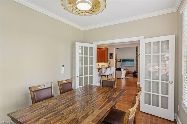 3741 Canter Dr, Trinity, NC 27370 - dining area with ornamental molding, wood finished floors, plenty of natural light, and french doors