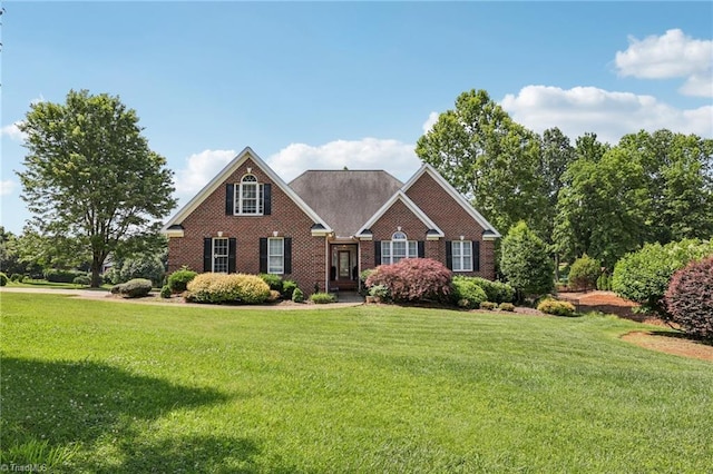 3741 Canter Dr, Trinity, NC 27370 - view of front facade with a front yard and brick siding