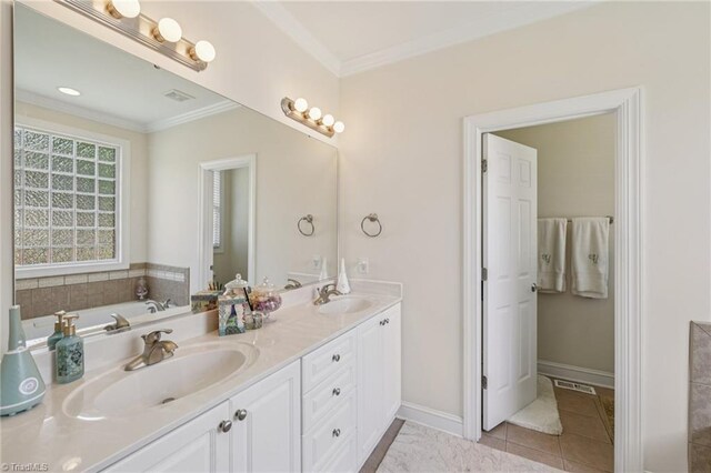 3741 Canter Dr, Trinity, NC 27370 - bathroom with double vanity, ornamental molding, a tub, and tile patterned floors