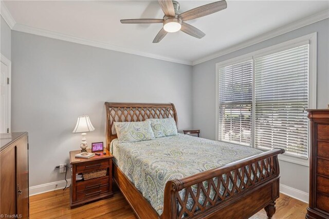 3741 Canter Dr, Trinity, NC 27370 - bedroom with wood finished floors, crown molding, and ceiling fan