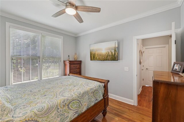 3741 Canter Dr, Trinity, NC 27370 - bedroom with wood finished floors, ornamental molding, and a ceiling fan