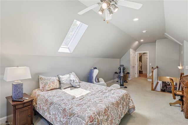 3741 Canter Dr, Trinity, NC 27370 - carpeted bedroom with lofted ceiling, a skylight, and a ceiling fan
