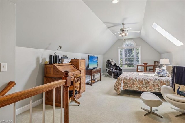 3741 Canter Dr, Trinity, NC 27370 - bedroom featuring light colored carpet, lofted ceiling, a skylight, and a ceiling fan