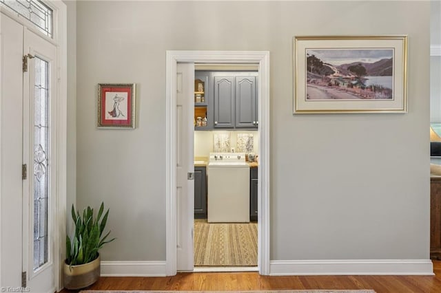 3741 Canter Dr, Trinity, NC 27370 - foyer entrance featuring washer / dryer and wood finished floors