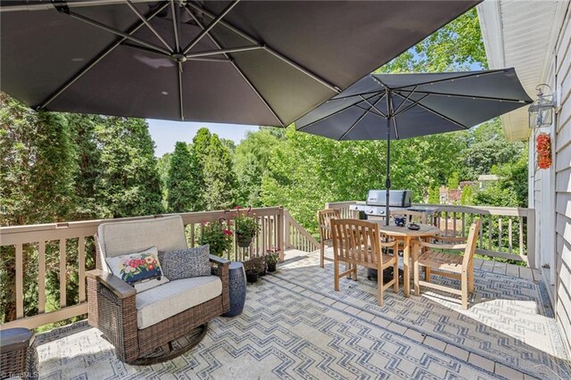 3741 Canter Dr, Trinity, NC 27370 - view of patio with outdoor dining space and a wooden deck