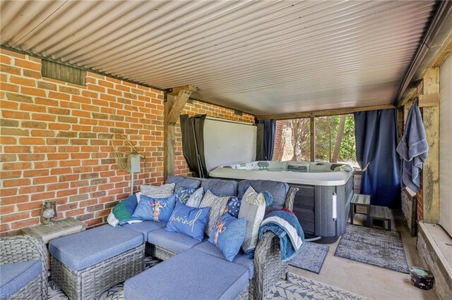 3741 Canter Dr, Trinity, NC 27370 - sunroom with a jacuzzi and an outdoor living space