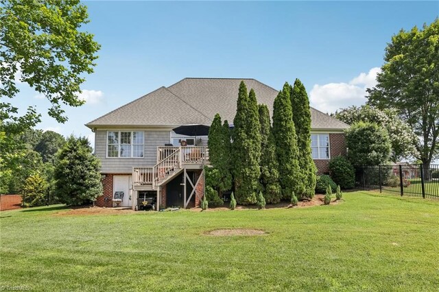 3741 Canter Dr, Trinity, NC 27370 - back of house featuring stairway, brick siding, and a deck