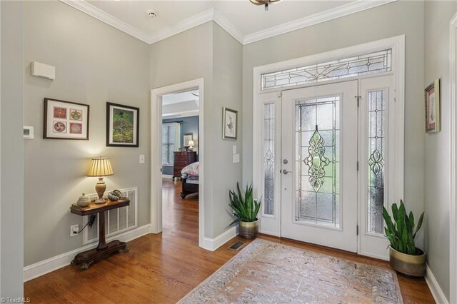 3741 Canter Dr, Trinity, NC 27370 - foyer entrance featuring wood finished floors and crown molding