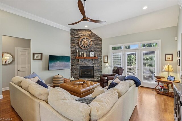 3741 Canter Dr, Trinity, NC 27370 - living room with a ceiling fan, a fireplace, wood finished floors, lofted ceiling, and ornamental molding