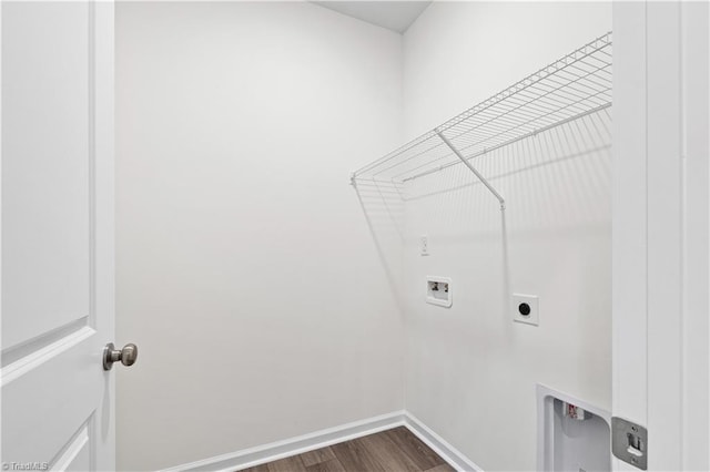 laundry area featuring dark wood-style floors, baseboards, hookup for an electric dryer, laundry area, and washer hookup