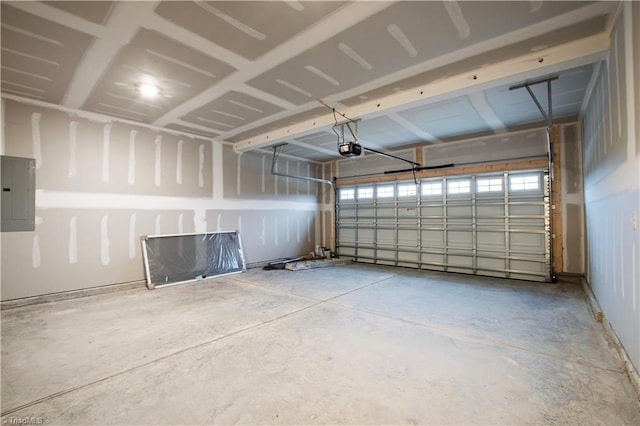 garage featuring electric panel and a garage door opener