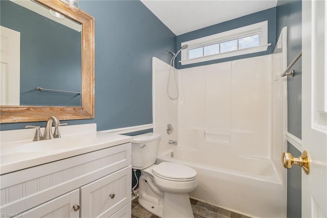 full bathroom featuring vanity, shower / tub combination, and toilet