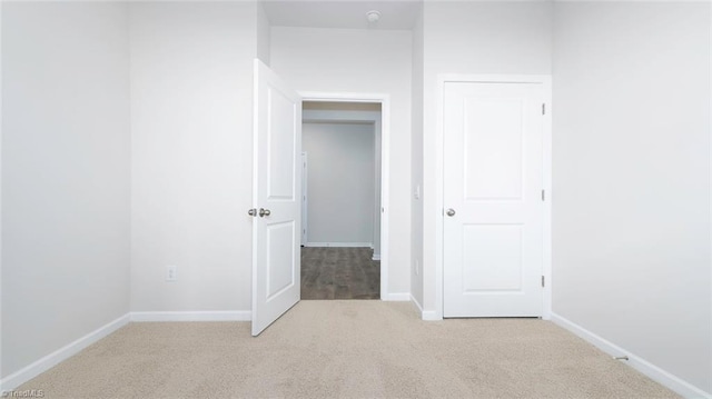 280 Lisa Ln, Winston-Salem, NC 27107 - unfurnished bedroom featuring carpet floors and baseboards