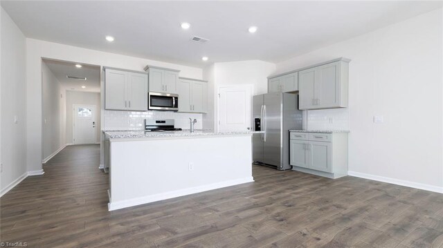 280 Lisa Ln, Winston-Salem, NC 27107 - kitchen featuring appliances with stainless steel finishes, gray cabinetry, backsplash, and recessed lighting