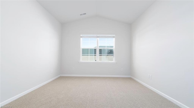 280 Lisa Ln, Winston-Salem, NC 27107 - unfurnished room featuring light colored carpet, baseboards, and lofted ceiling