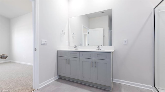 280 Lisa Ln, Winston-Salem, NC 27107 - full bathroom featuring double vanity, baseboards, and a shower