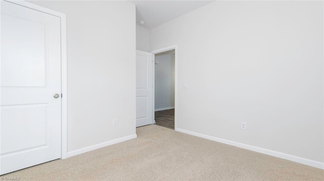 280 Lisa Ln, Winston-Salem, NC 27107 - unfurnished bedroom with carpet flooring and baseboards