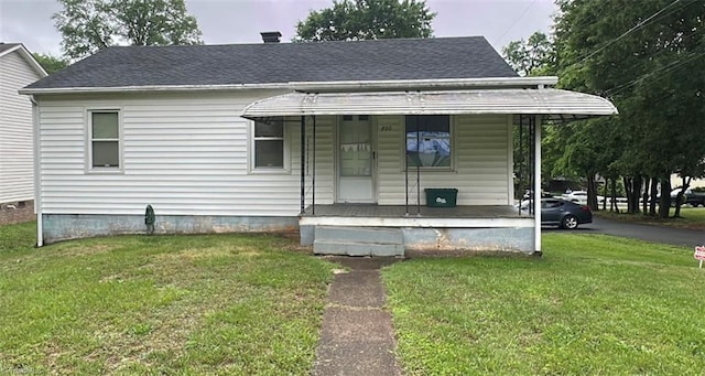 800 Essex Rd, Winston-Salem, NC 27105 - view of front of property featuring a porch, a front yard, and a shingled roof