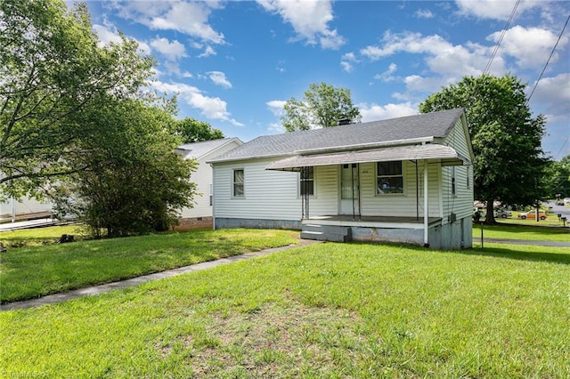 800 Essex Rd, Winston-Salem, NC 27105 - view of front of property with covered porch, a front yard, and roof with shingles