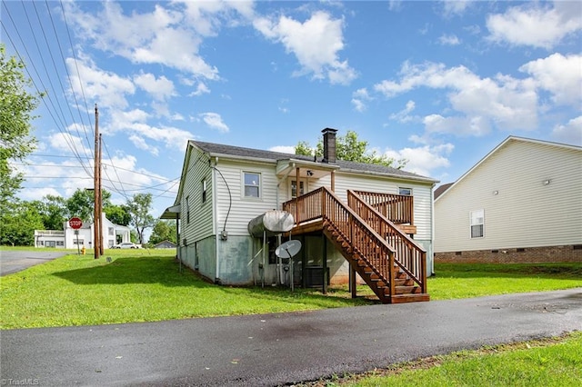 800 Essex Rd, Winston-Salem, NC 27105 - view of front facade featuring a deck, stairs, and a front yard