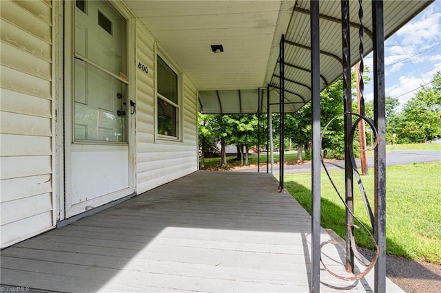 800 Essex Rd, Winston-Salem, NC 27105 - wooden terrace with a lawn and a carport