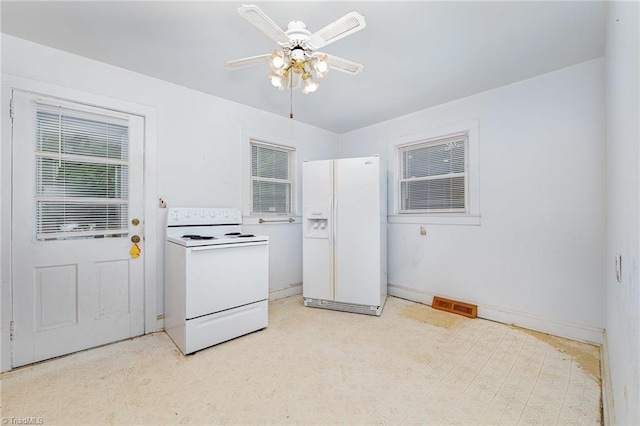 800 Essex Rd, Winston-Salem, NC 27105 - kitchen featuring white appliances, a ceiling fan, and baseboards