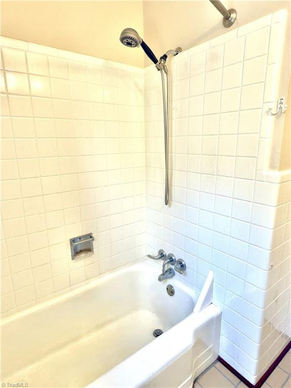 211 Hermitage Rd, Greensboro, NC 27403 - bathroom with shower / washtub combination and tile patterned flooring