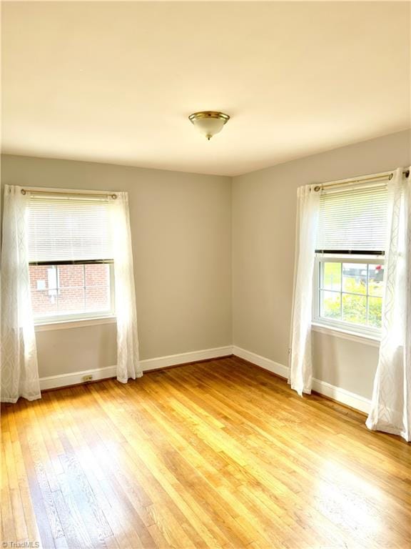 211 Hermitage Rd, Greensboro, NC 27403 - empty room with baseboards and light wood-style floors
