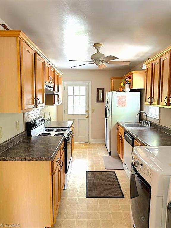 211 Hermitage Rd, Greensboro, NC 27403 - kitchen featuring black electric range oven, ventilation hood, dishwasher, ceiling fan, and a sink