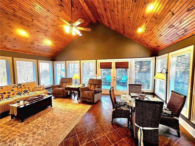 sunroom featuring lofted ceiling, french doors, a wealth of natural light, and wood ceiling