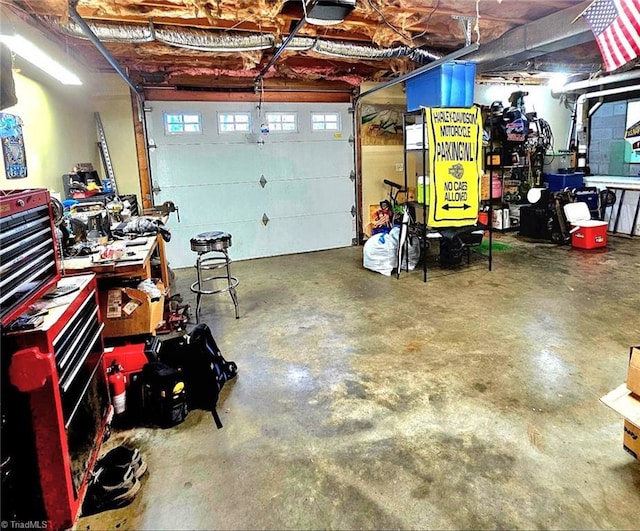 garage featuring a garage door opener