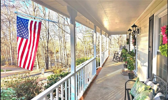 balcony featuring a porch