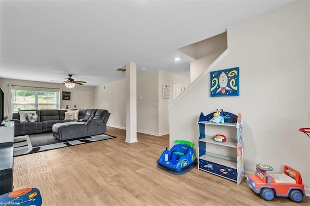 playroom featuring wood finished floors, a ceiling fan, baseboards, and recessed lighting