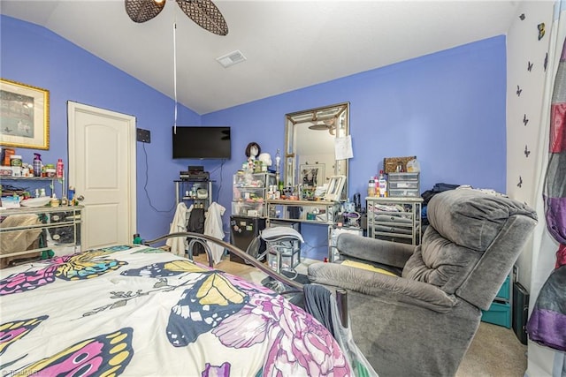 bedroom featuring vaulted ceiling, visible vents, a ceiling fan, and carpet flooring
