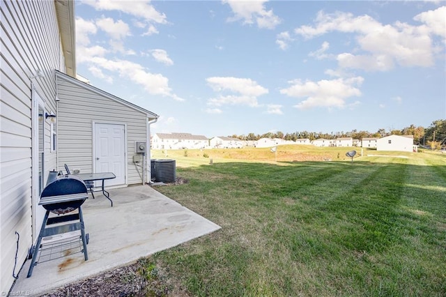 view of yard with a patio area and cooling unit