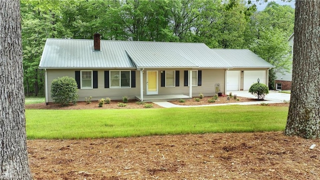 ranch-style home with a front yard, a garage, and covered porch